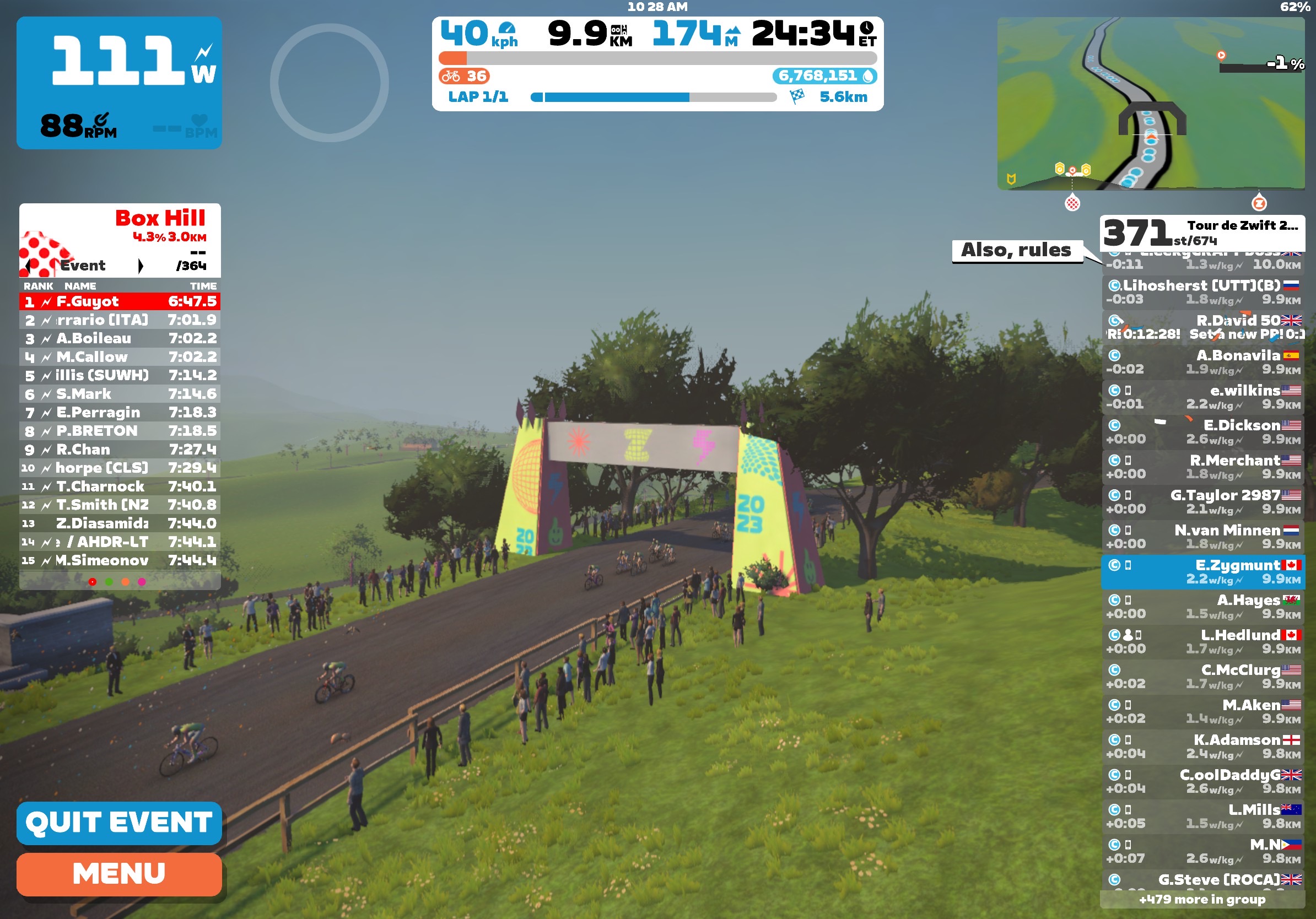 Screenshot of the virtual cycling game Zwift. Idyllic virtual countryside is topped with a finish line gantry. Various dashboards display power, speed, and fellow rider information.